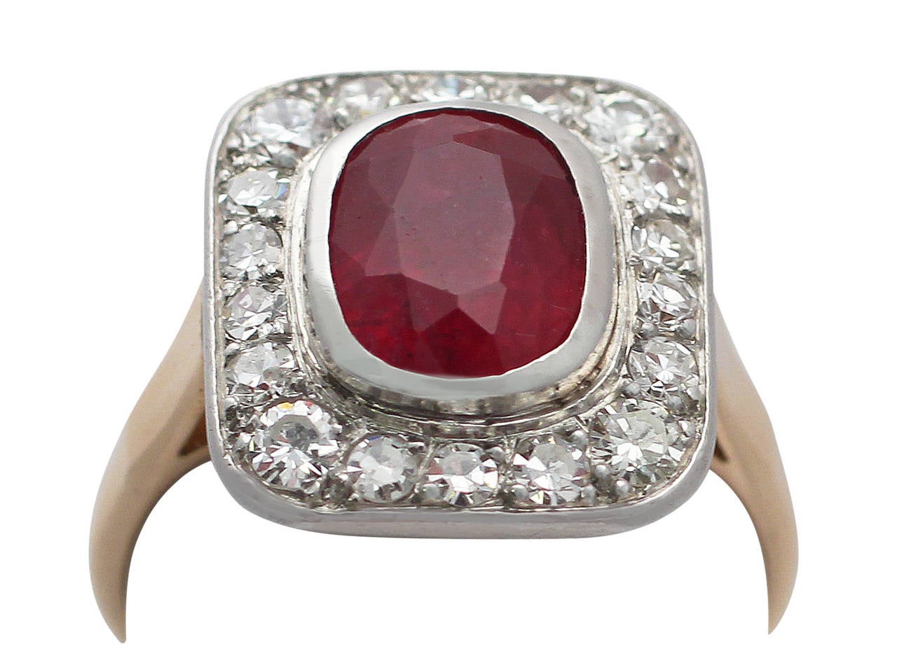A fine and impressive antique French 2.85 carat natural ruby and 0.75 carat diamond, 18 karat rose gold, platinum set dress ring; part of our antique jewelry and estate jewelry collections

This impressive antique French dress ring has been