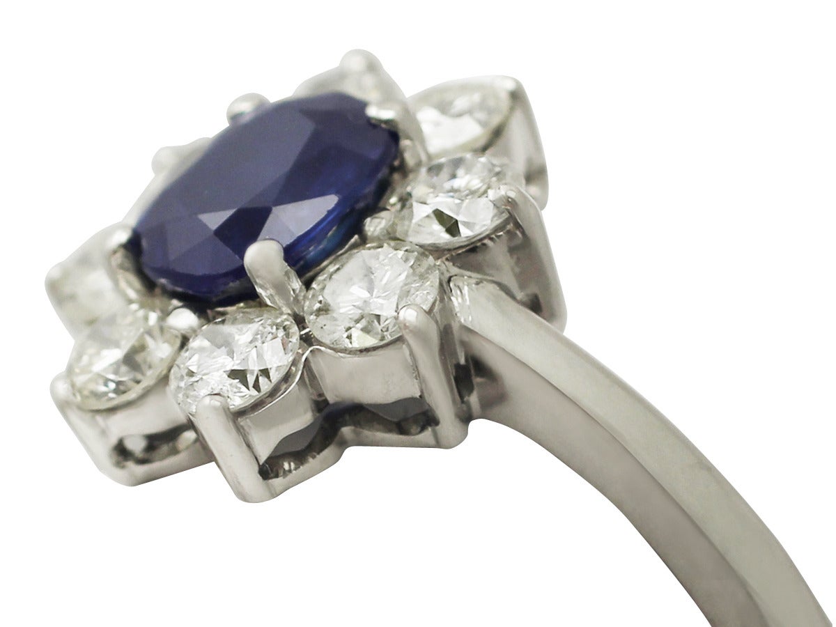 Round Cut 1980s 1.48 Carat Sapphire and 1.45 Carat Diamond White Gold Cocktail Ring