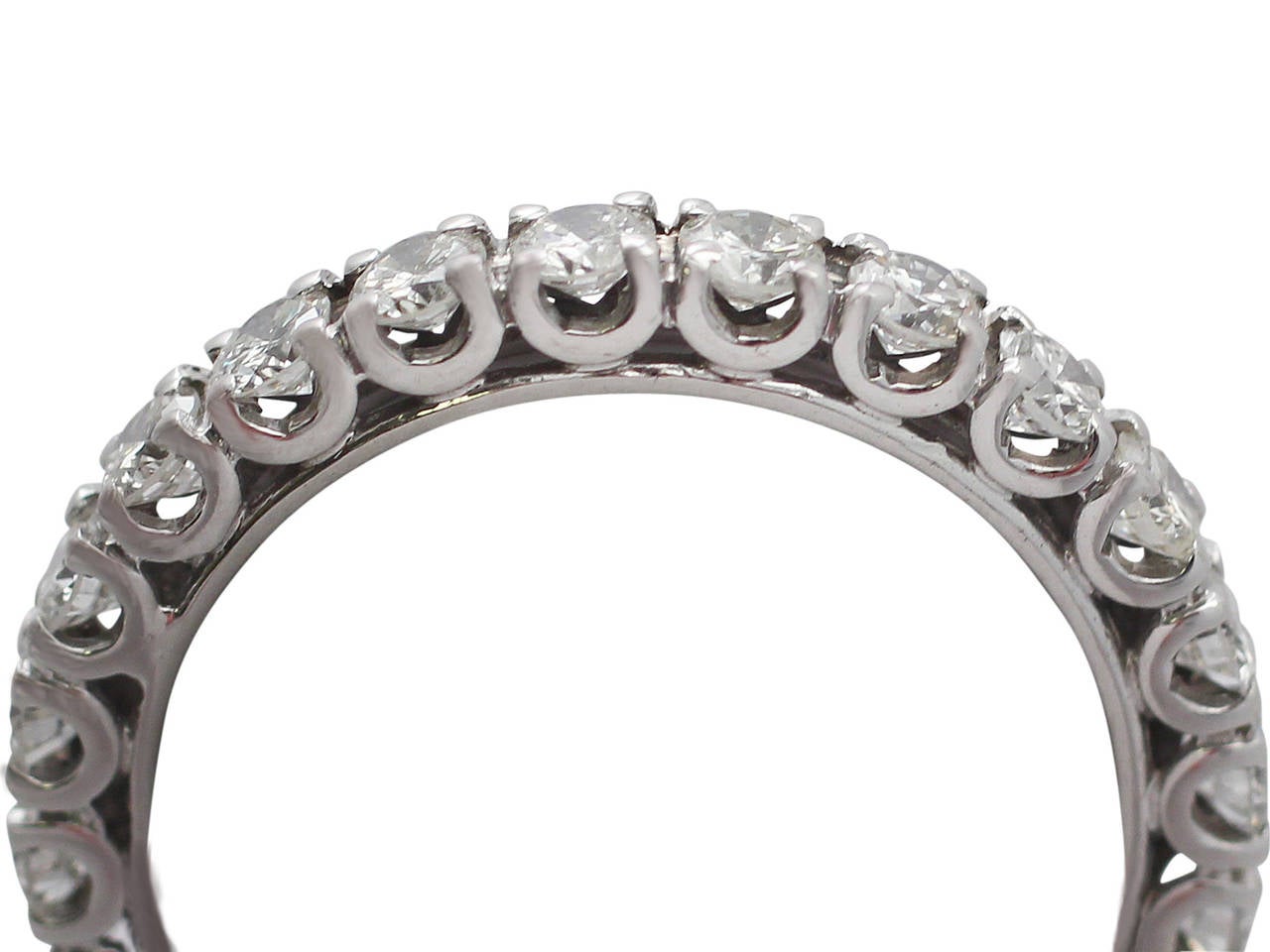 A fine and impressive vintage 1.76 carat diamond and 18 karat white gold full eternity ring; part of our vintage jewelry and estate jewelry collection

This vintage full diamond eternity ring has been crafted in 18k white gold.

The ring