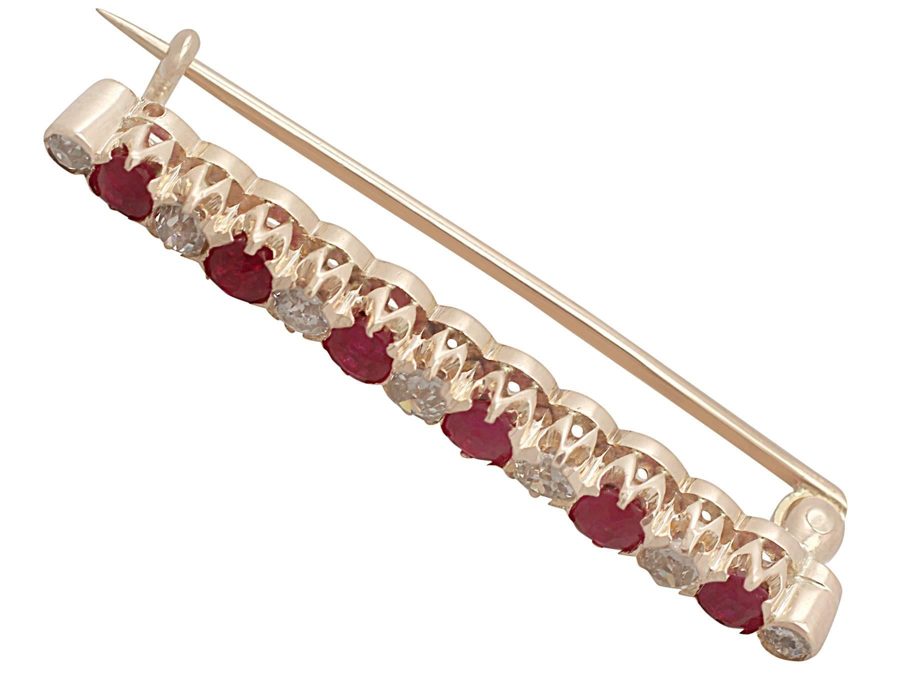 A fine and impressive antique 1.48 carat natural ruby and 0.85 carat diamond and 14 karat rose gold bar brooch; part of our gemstone jewelry and estate jewelry collections

This fine and impressive ruby and diamond brooch has been crafted in 14k