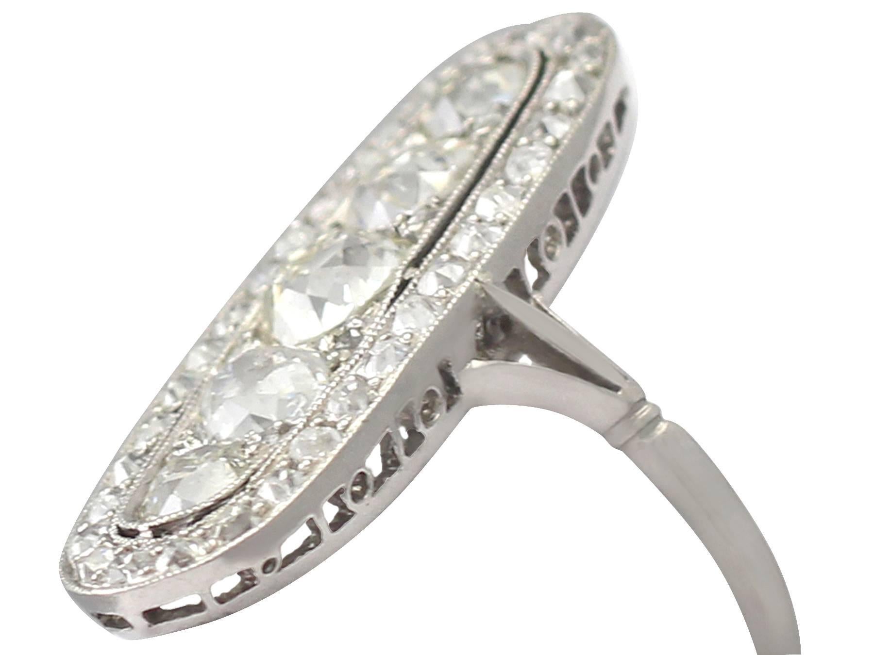 A stunning, fine and impressive vintage palladium dress ring with 3.24 carat (total) antique diamonds; part of our antique and vintage jewelry collections

This stunning, fine and impressive diamond dress ring has been crafted in