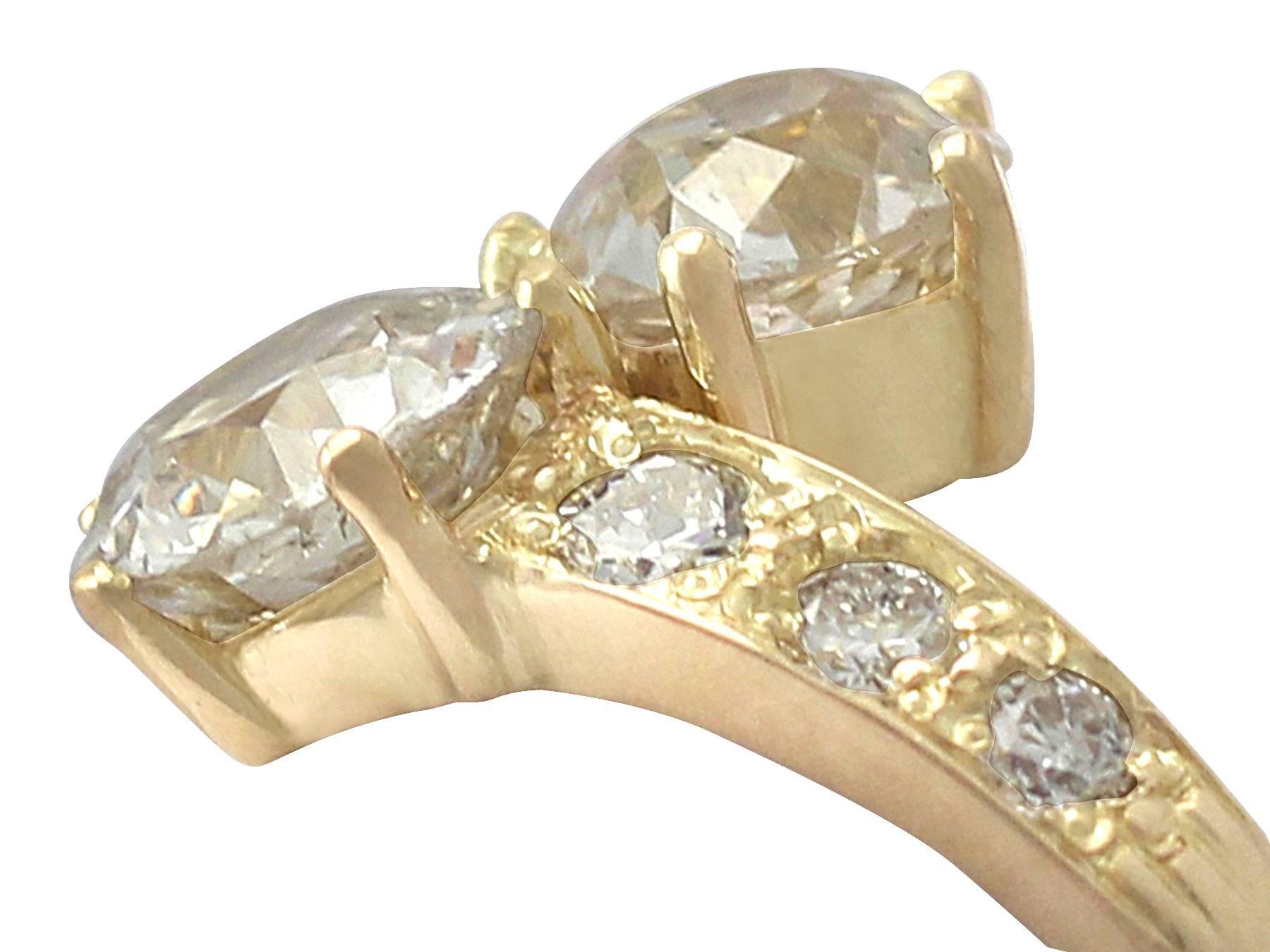 A stunning, fine and impressive antique 3.27 carat diamond and 18 karat yellow gold twist ring; part of our antique jewelry and estate jewelry collections

This stunning antique diamond twist ring has been crafted in 18k yellow gold.

The impressive
