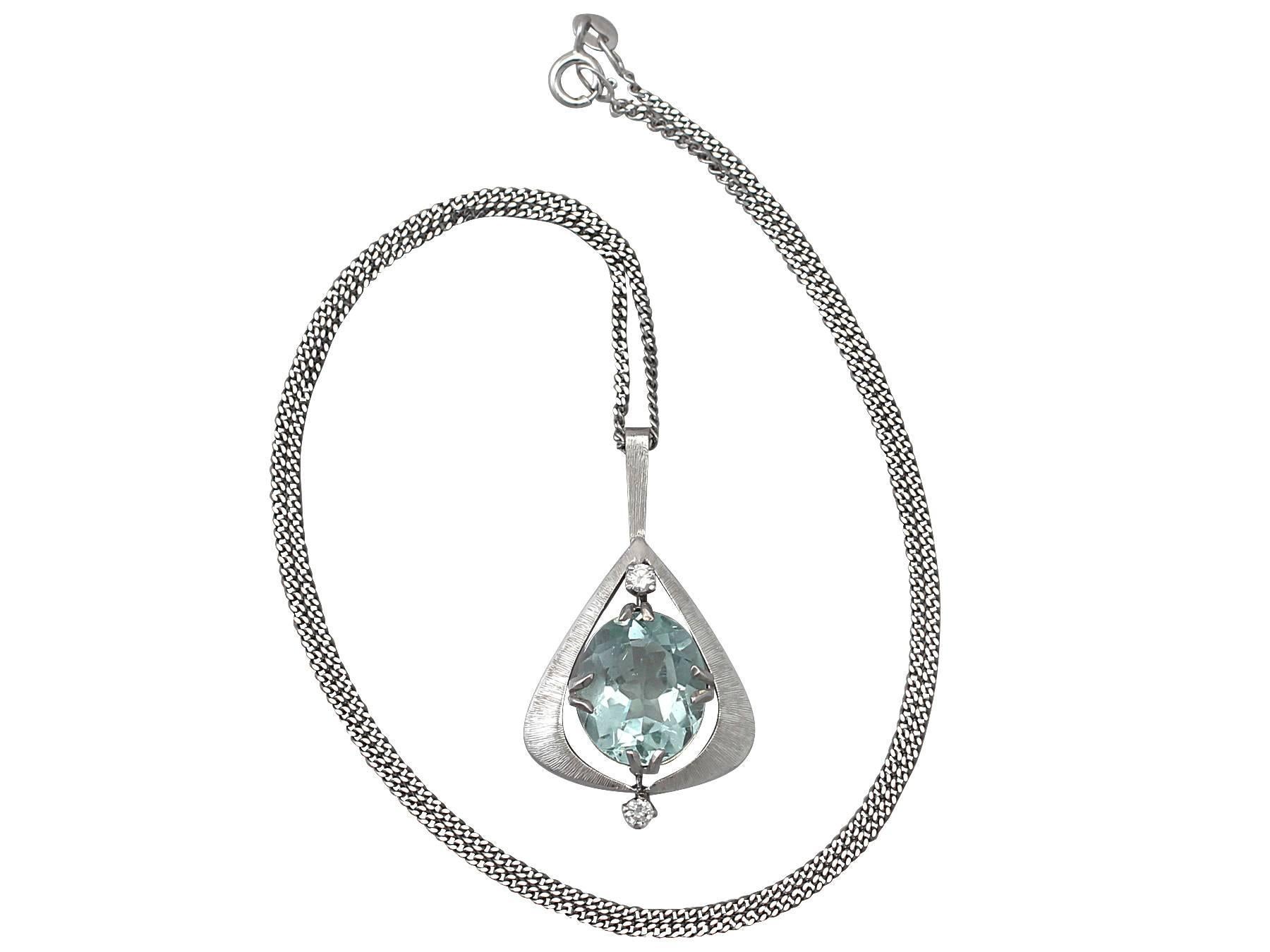 A fine and impressive vintage 6.09 carat aquamarine and 0.10 carat diamond pendant in 18 karat white gold; part of our diverse gemstone jewelry and estate jewelry collections

This fine and impressive aquamarine and diamond pendant has been
