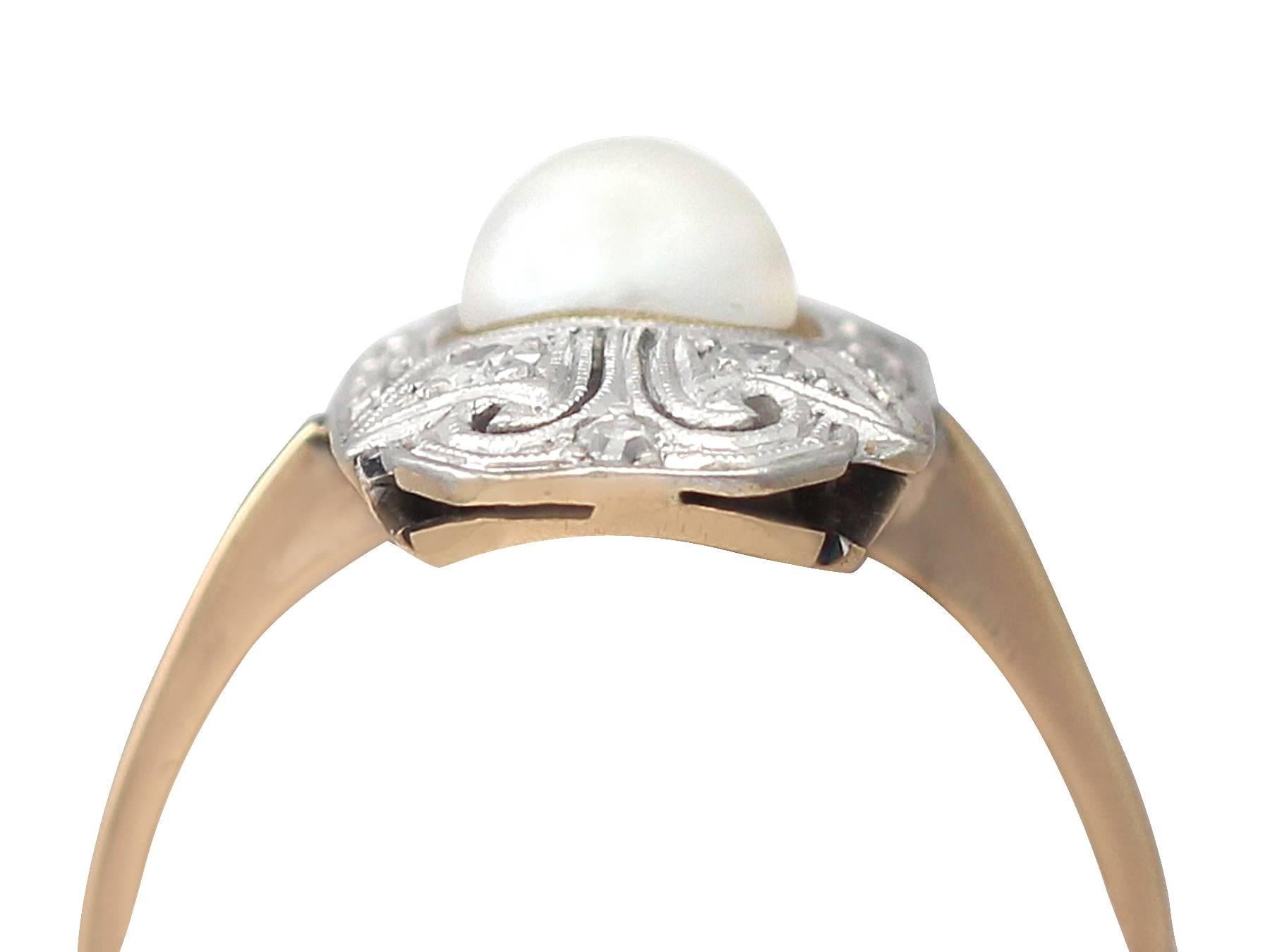 A fine and impressive 6mm natural pearl and 0.28 carat diamond, 14 karat yellow gold, platinum set dress ring; part of our antique jewelry and estate jewelry collections.

This fine and impressive pearl and diamond ring has been crafted in 14 k