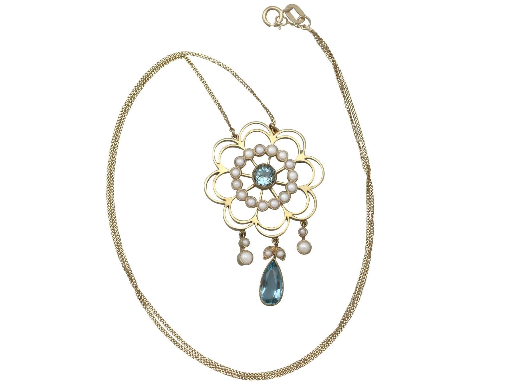 A stunning, fine and impressive antique 0.92 carat aquamarine and seed pearl pendant in 15 karat yellow gold; part of our diverse antique jewelry and estate jewelry collections

This stunning antique pearl and aquamarine pendant has been crafted in