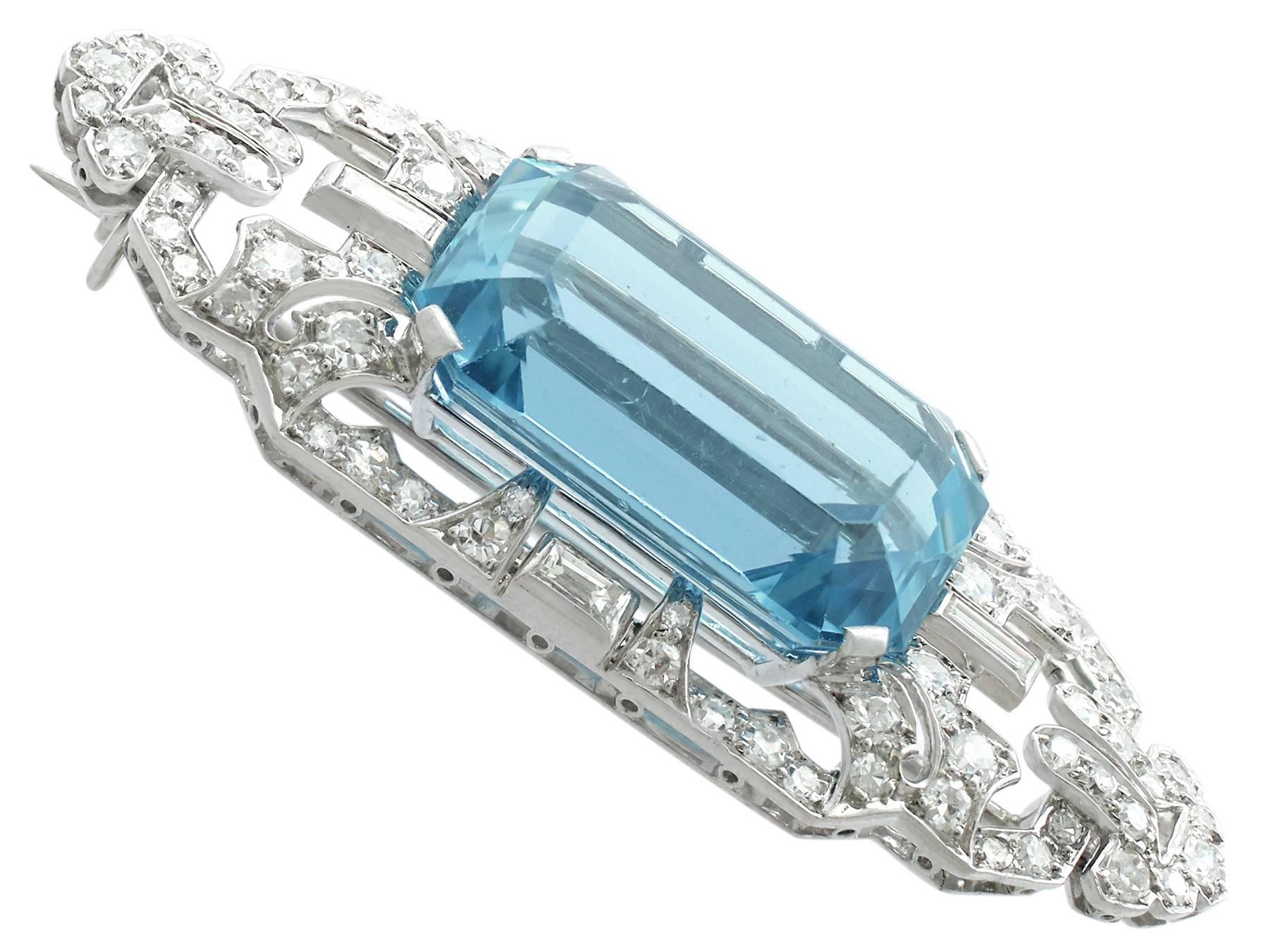A magnificent and stunning 1.48 carat diamond, 19.82 carat aquamarine brooch in platinum made by Liberty; part of 's authentic antique Art Deco jewelly and estate jewelry collections

This magnificent antique brooch made by Liberty* has been crafted
