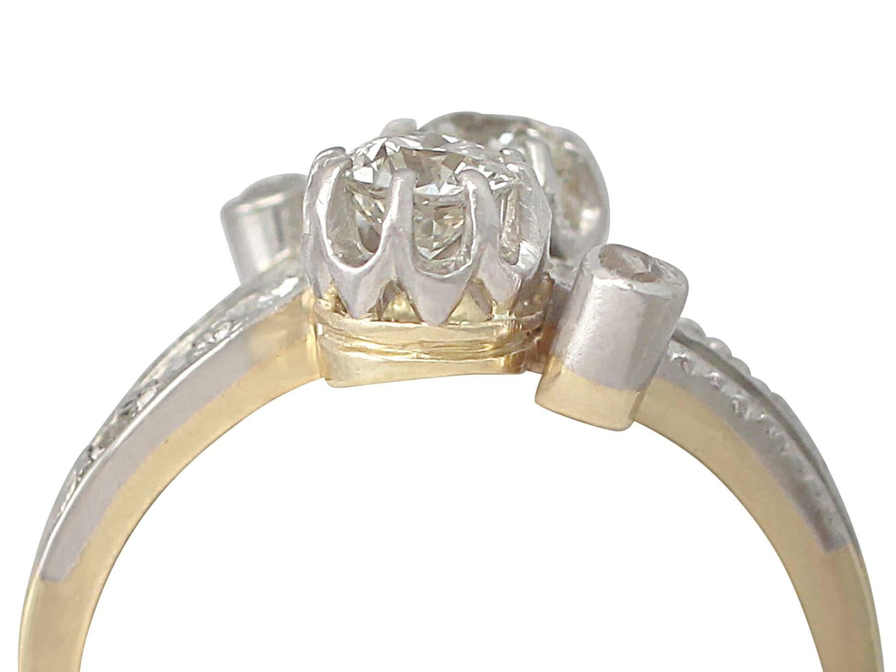 A fine and impressive 0.75 carat (total) diamond and 18 karat yellow gold, platinum set twist ring; part of our diverse antique jewelry and estate jewelry collections

This fine and impressive antique diamond twist ring has been crafted in 18k