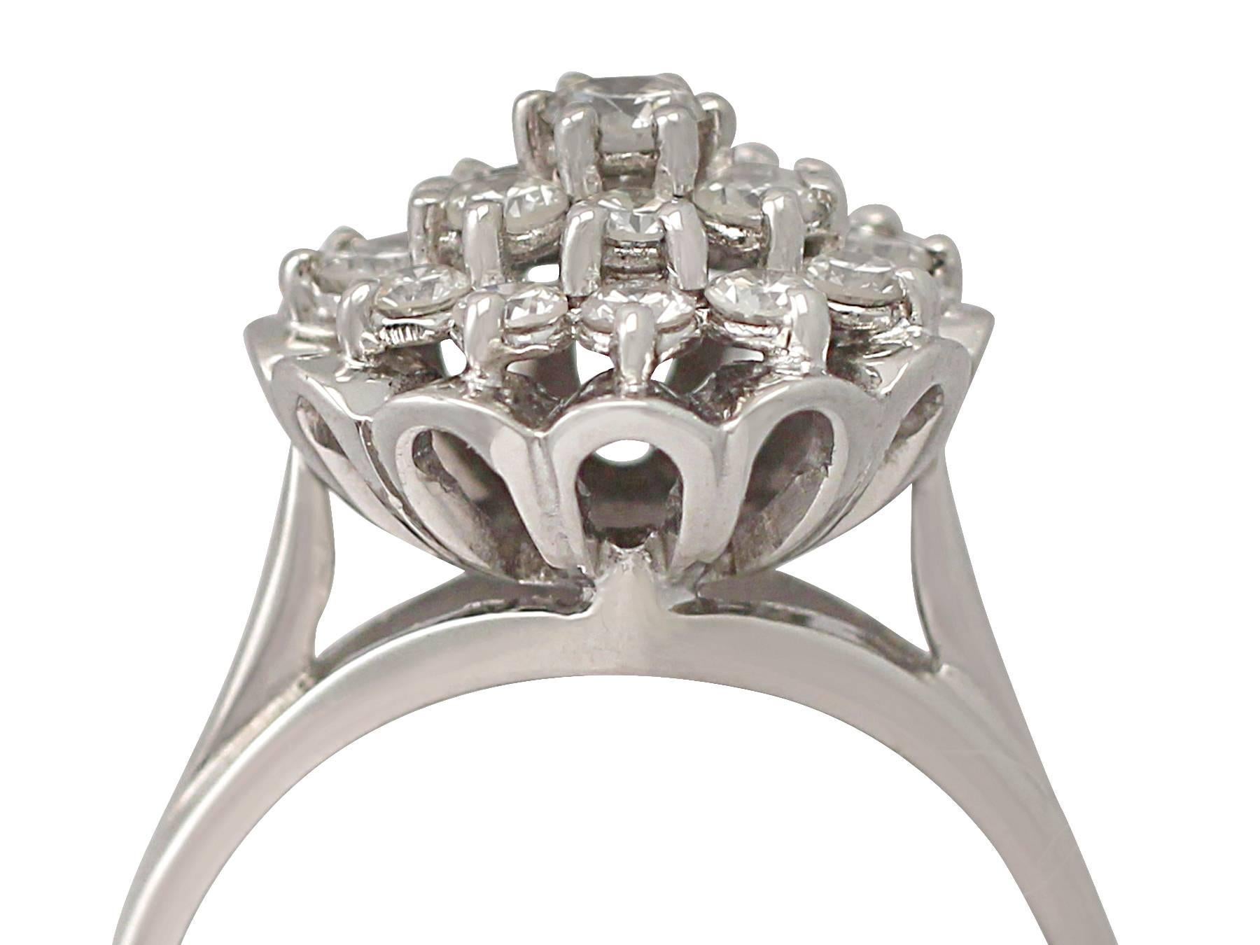 A stunning, fine and impressive vintage 1.63 carat diamond and 18 karat white gold dress ring; part of our vintage jewelry and estate jewelry collections

This stunning, fine and impressive vintage diamond cluster ring has been crafted in 18k