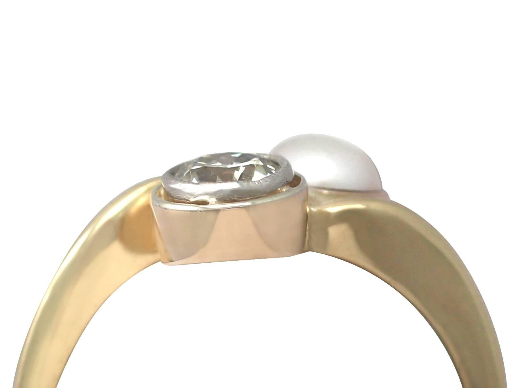 A fine and impressive pearl and 0.48 carat diamond, 18 karat yellow gold twist ring; part of our diverse antique jewelry and estate jewelry collections

This fine and impressive antique  pearl and diamond ring has been crafted in 18k yellow gold