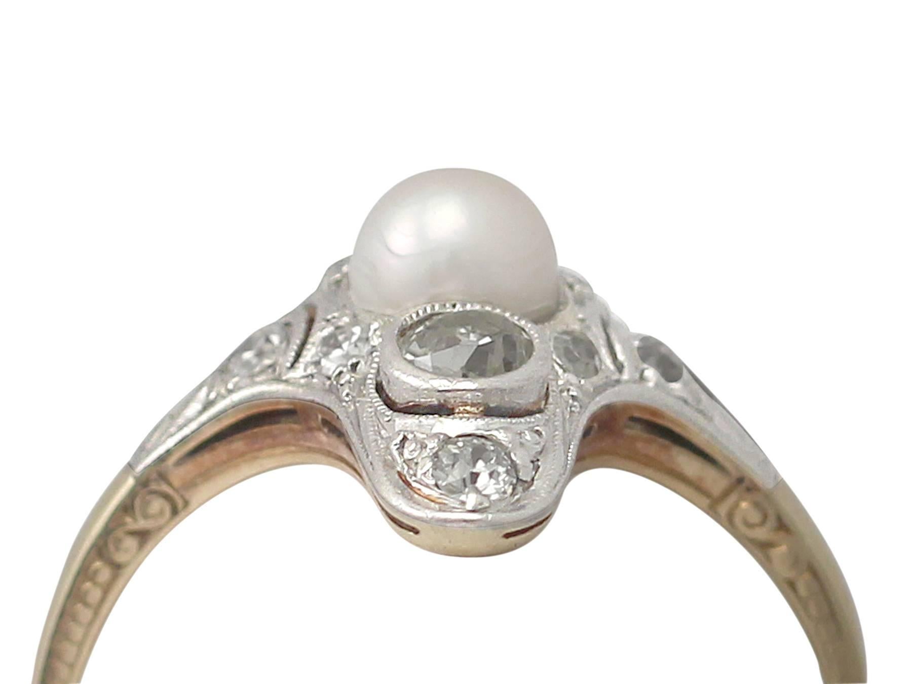 A fine and impressive antique pearl and 0.45 carat diamond, 14 karat yellow gold, 14 karat white gold set dress ring; part our antique jewelry and estate jewelry collections

This fine and impressive pearl and diamond ring has been crafted in 14k