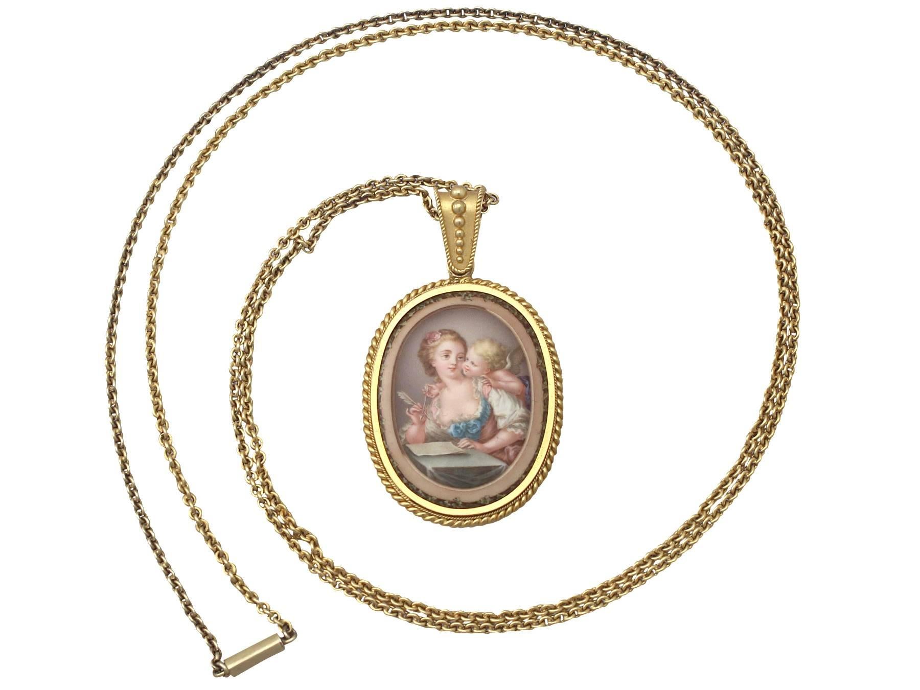 A fine and impressive antique Victorian hand painted miniature portrait pendant in 18 karat yellow gold; part of our diverse antique jewelry and estate jewelry collections

This exceptional, fine and impressive antique pendant has been crafted in