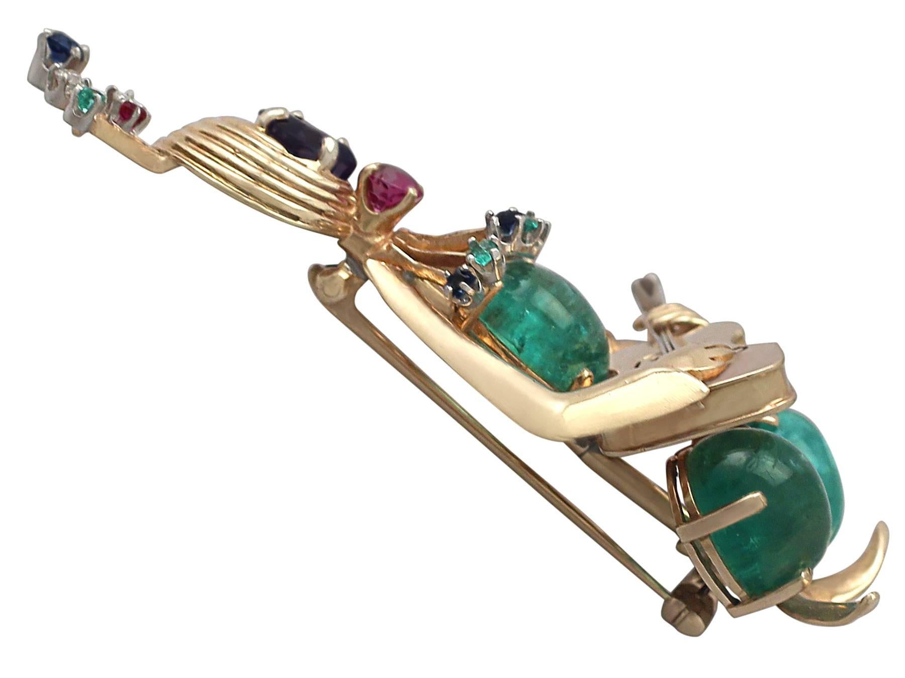A stunning, fine and impressive 20.38 carat (total) precious gemstone and diamond, tutti frutti style, 14 karat yellow gold brooch; part of our vintage jewelry and estate jewelry collections

This stunning vintage multi-gemstone brooch has been