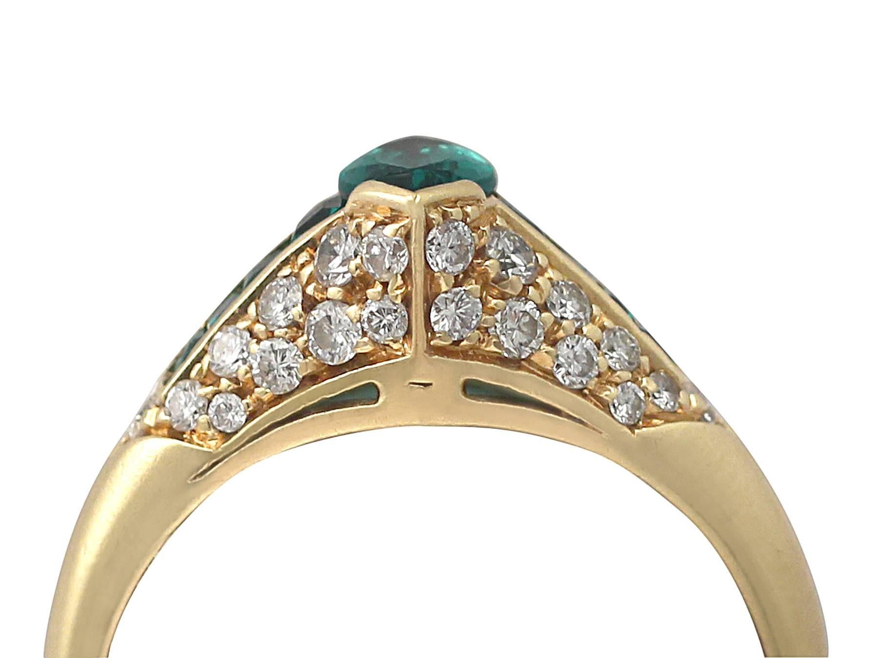 A stunning, fine and impressive vintage 0.75 carat natural emerald and 0.59 carat diamond, 18 karat yellow gold dress ring; part of our diverse vintage jewelry and estate jewelry collections

This stunning, fine and impressive emerald and diamond