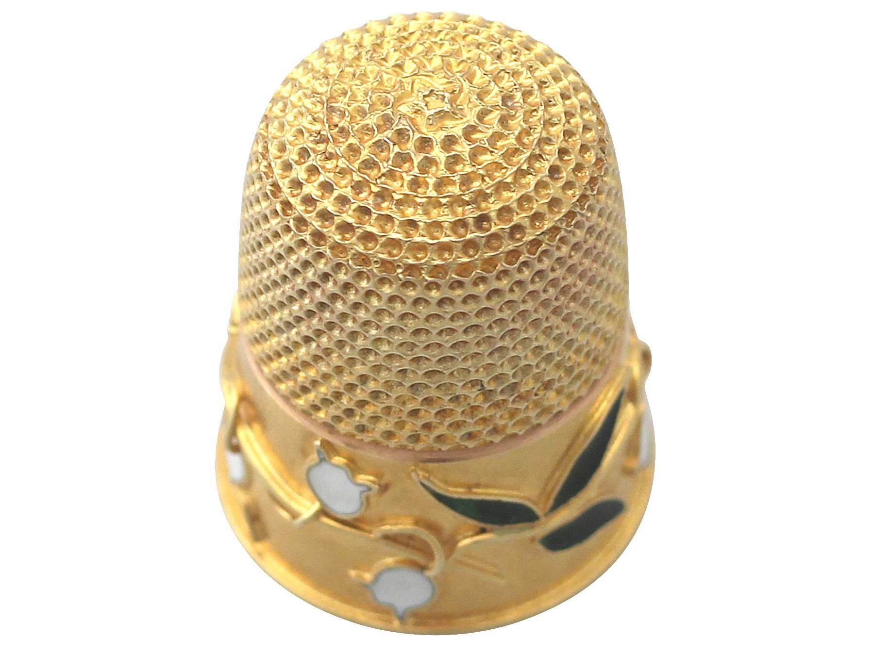 A fine and impressive antique Victorian 14 karat yellow gold thimble with enamel decoration; an addition to our diverse range of collectable antiques

This fine and impressive antique thimble has been crafted in 14k yellow gold.

The thimble has a