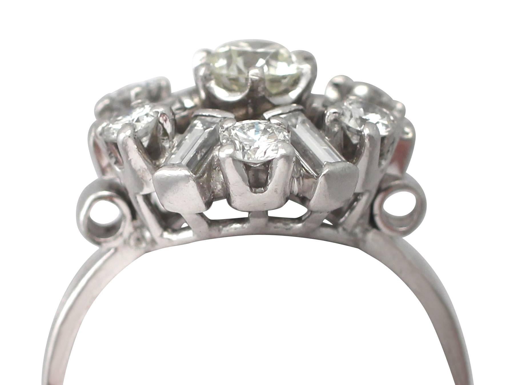 A stunning, fine and impressive vintage 1.66 carat diamond and platinum dress / cluster ring; part of our diverse diamond jewelry and estate jewelry collections

This stunning, fine and impressive diamond cluster ring has been crafted in