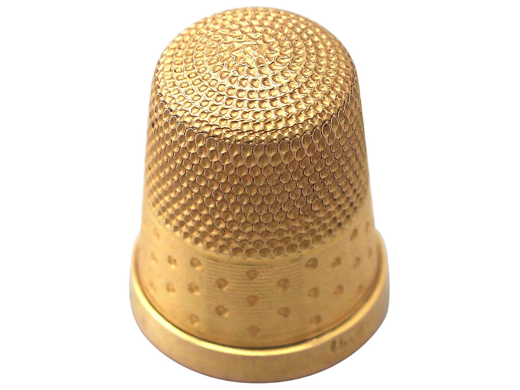 A fine and impressive antique Victorian 15 karat yellow gold thimble; an addition to our diverse range of collectable antiques

This fine and impressive antique thimble has been crafted in 15k yellow gold.

The thimble has a pitted crown and a