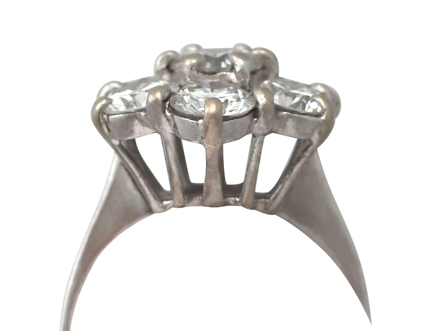 A stunning, fine and impressive vintage 3.02 carat diamond and 18 carat white gold cluster ring; an addition to our diverse range of diamond jewelry

This fine and impressive vintage cluster ring has been crafted in 18k white gold.

The pierced