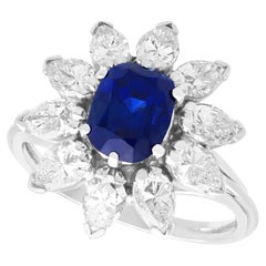 Vintage 2.19 Carat Sapphire and 2.3 Carat Diamond Platinum Cluster Ring
