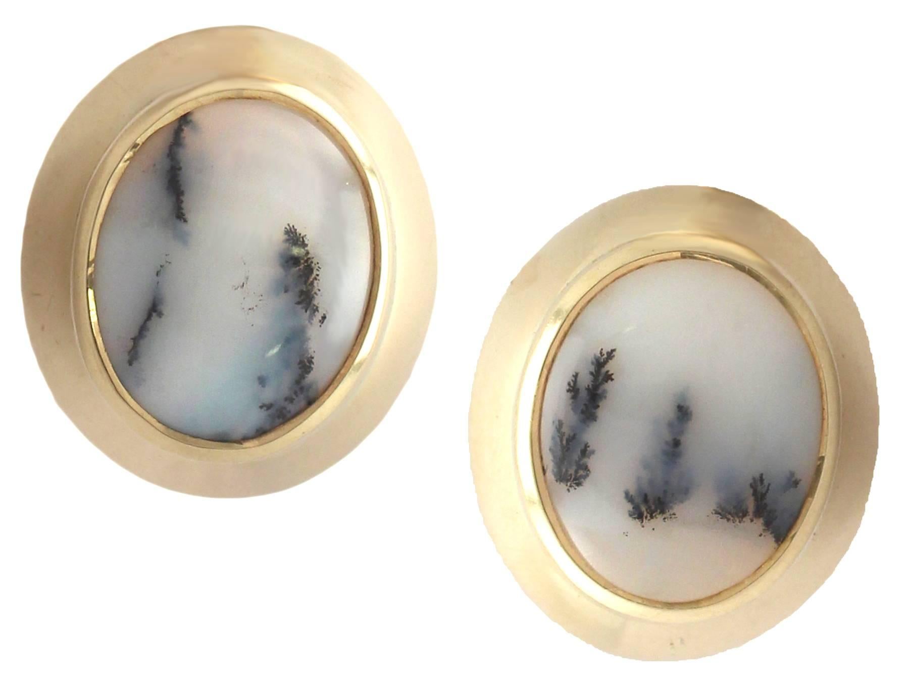 A fine and impressive pair of vintage moss agate and 18 karat yellow gold cufflinks; an addition our diverse vintage jewelry and estate jewelry collections

This fine and impressive pair of agate cufflinks has been crafted in 18k yellow
