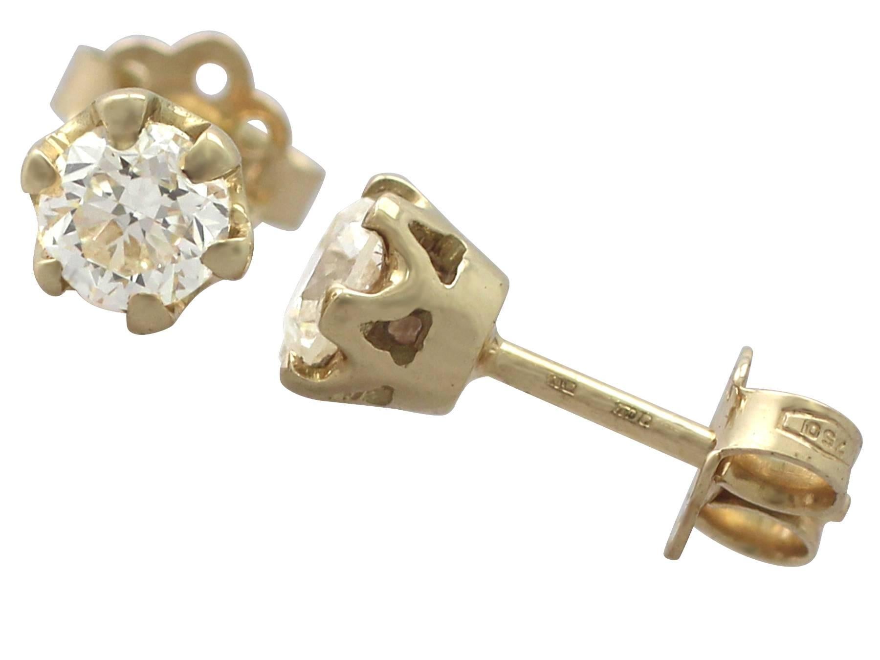 A fine and impressive pair of vintage 0.84 carat diamond (total) stud earrings in 18 karat yellow gold; part of our diamond jewelry and estate jewelry collections

Description

These fine and impressive diamond stud earrings have been crafted in