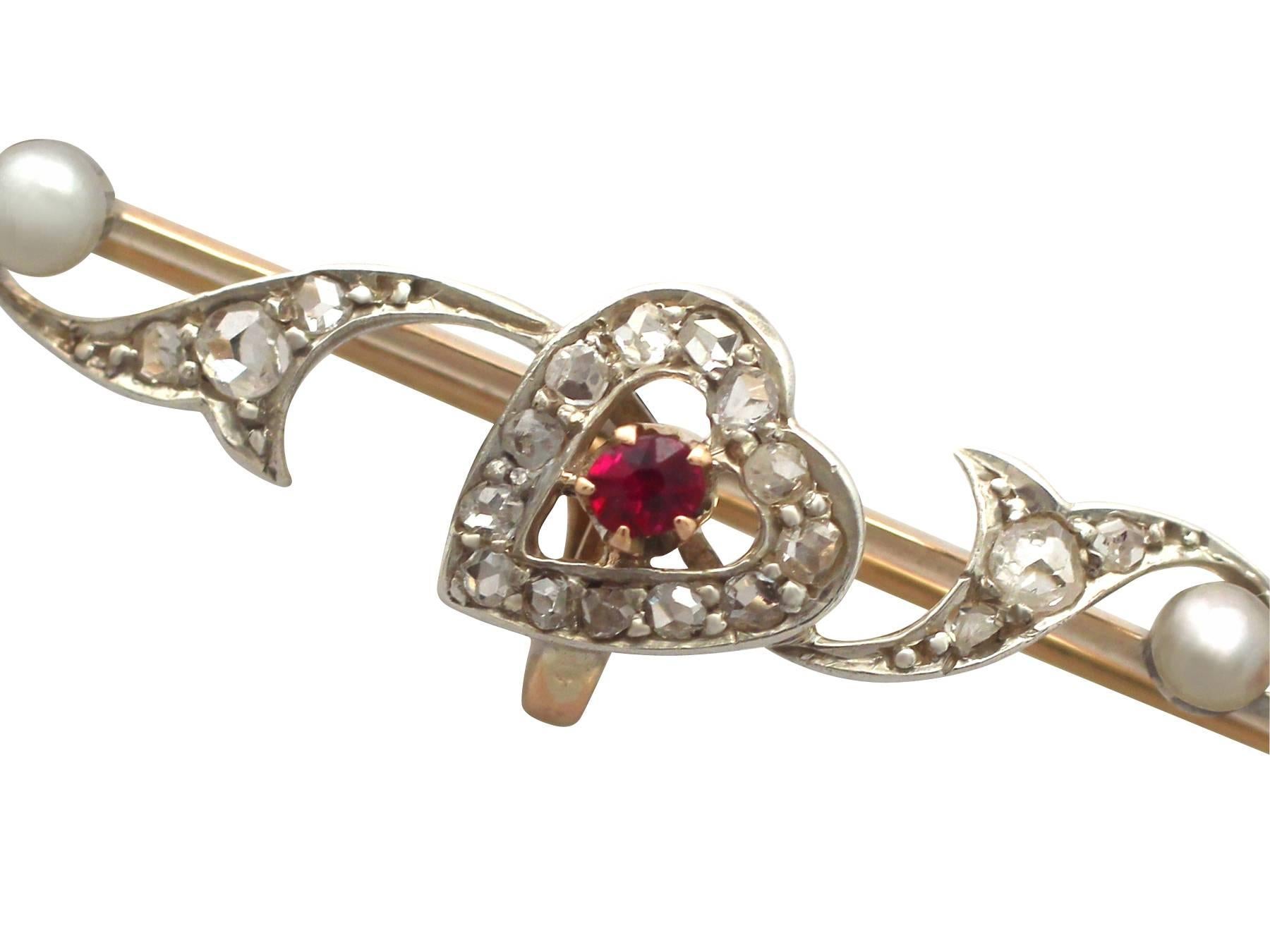 A fine and impressive antique Victorian 0.52 carat natural ruby, 0.29 carat diamond and seed pearl, 14 karat yellow gold and 14k white gold set bar style brooch; part of our diverse antique jewelry / estate jewelry collections

This fine and
