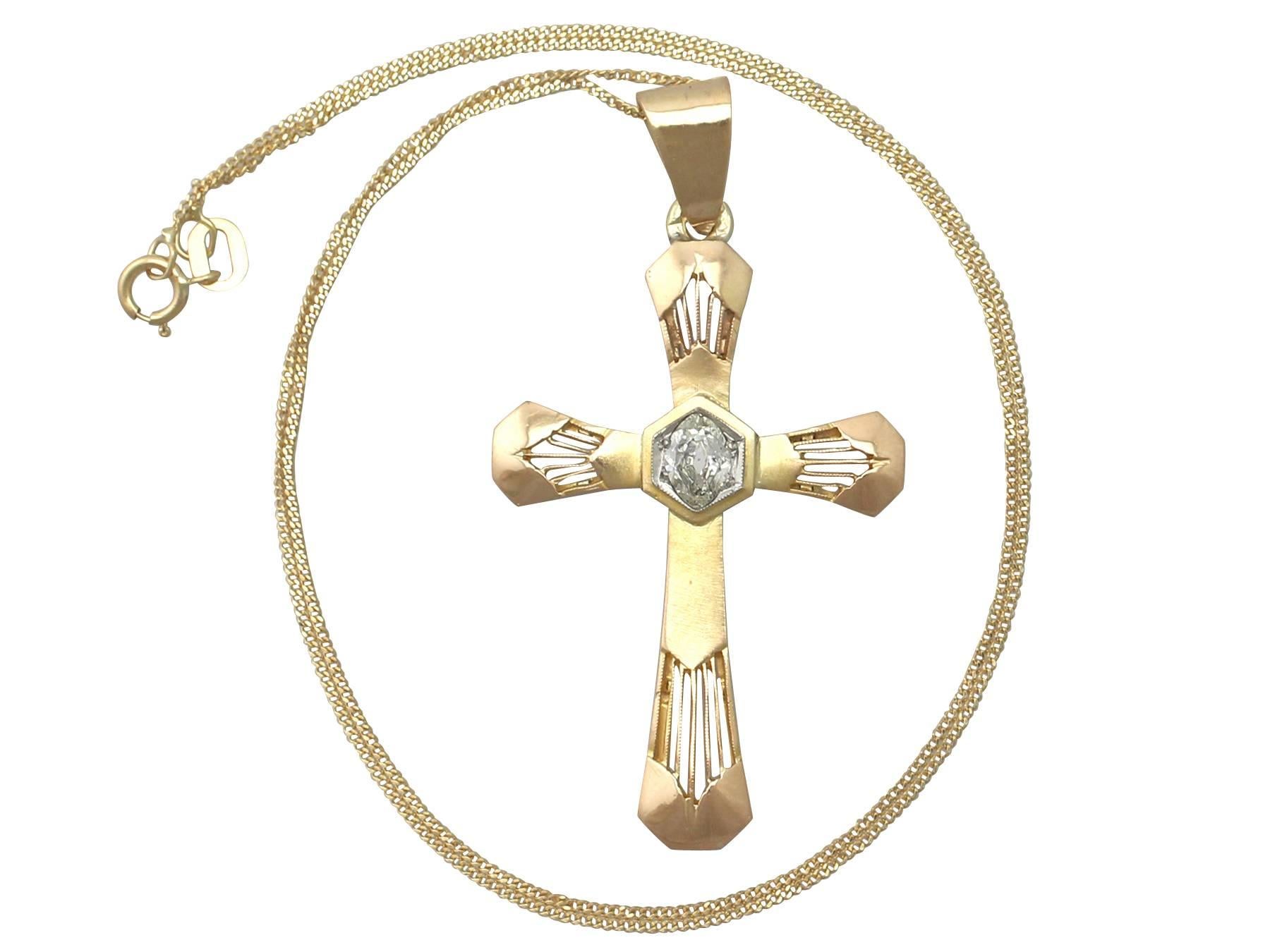 A fine and impressive antique German 0.35 carat diamond and 14 karat yellow gold, 14 karat white gold set cross pendant; part of our diverse diamond jewelry collection

This fine and impressive diamond cross pendant has been crafted in 14k yellow