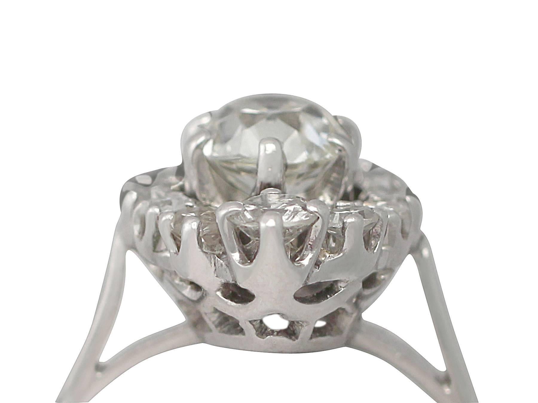 A fine and impressive antique 1.49 carat diamond and 18k white gold, platinum set cocktail ring; part of our collection of antique diamond rings

This fine and impressive antique diamond dress ring has been crafted in 18k white gold with a