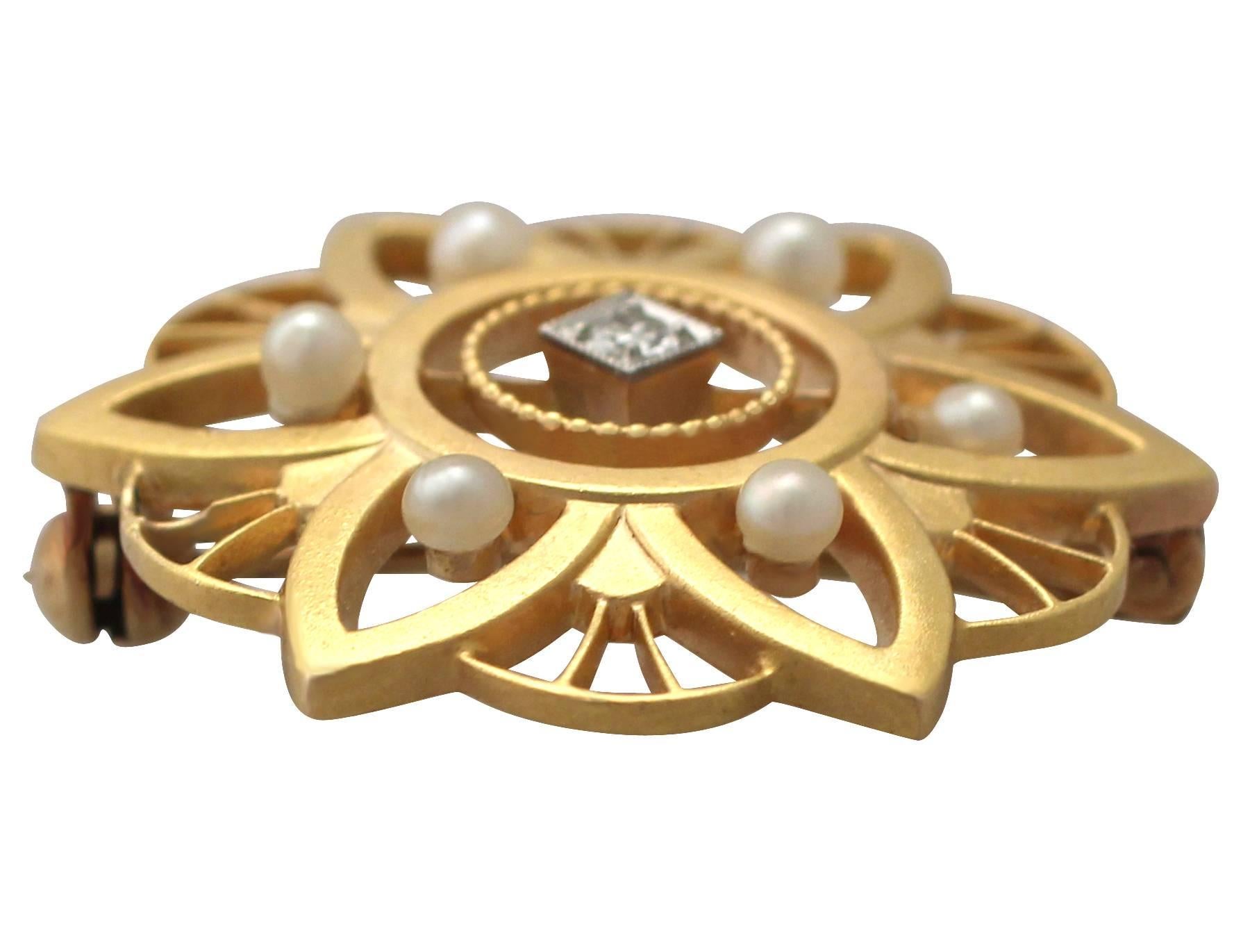 A fine and impressive seed pearl and diamond, 14k yellow gold brooch; part of our diverse antique jewellery and estate jewelry collections

This impressive antique pearl brooch has been crafted in 14k yellow gold.

The brooch is ornamented with