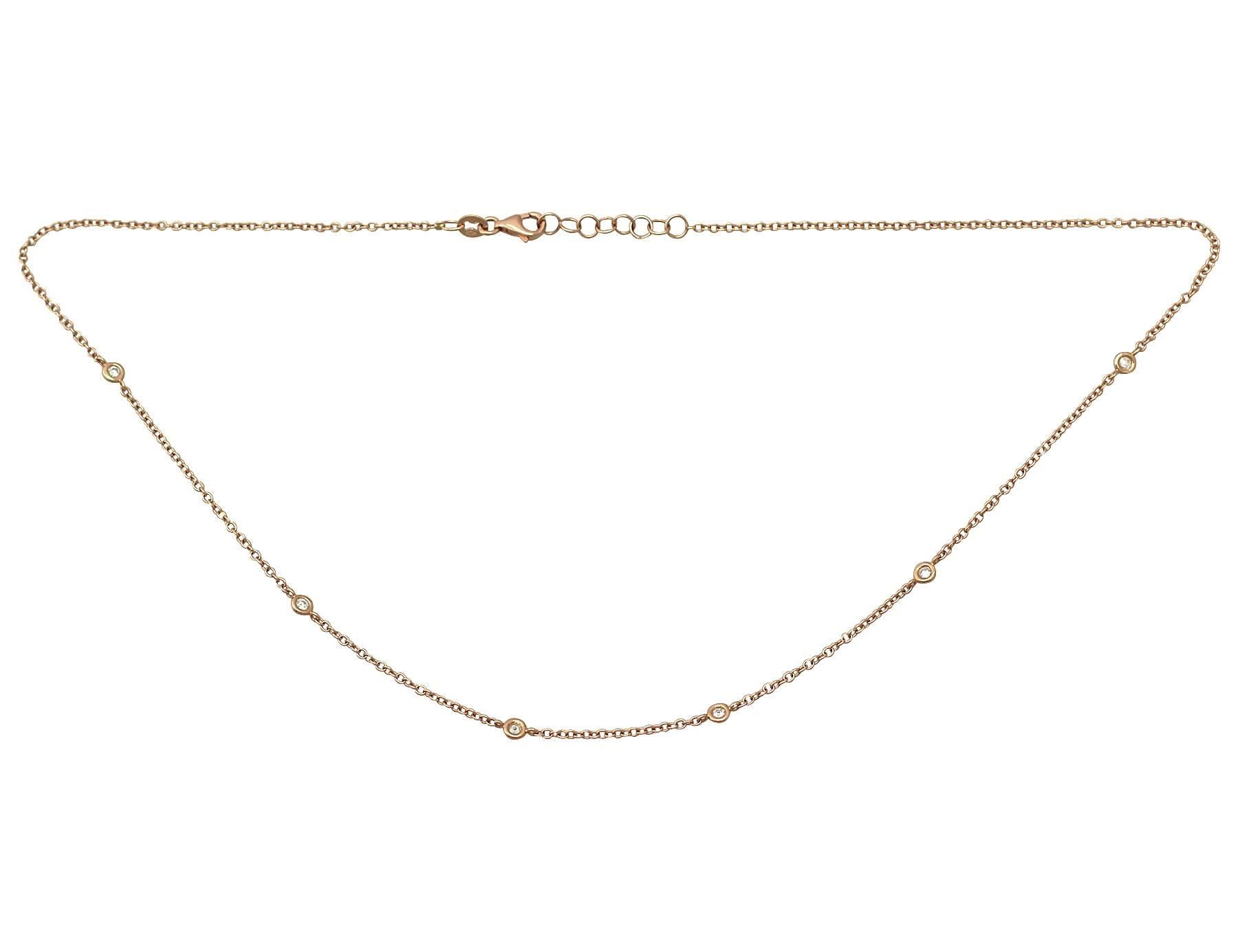 A fine vintage Italian 0.12 carat diamond and 18 karat rose gold necklace; part of our diverse vintage jewelry and estate jewelry collections

This fine vintage diamond necklace has been crafted in 18k yellow gold.

The fine link belcher chain is