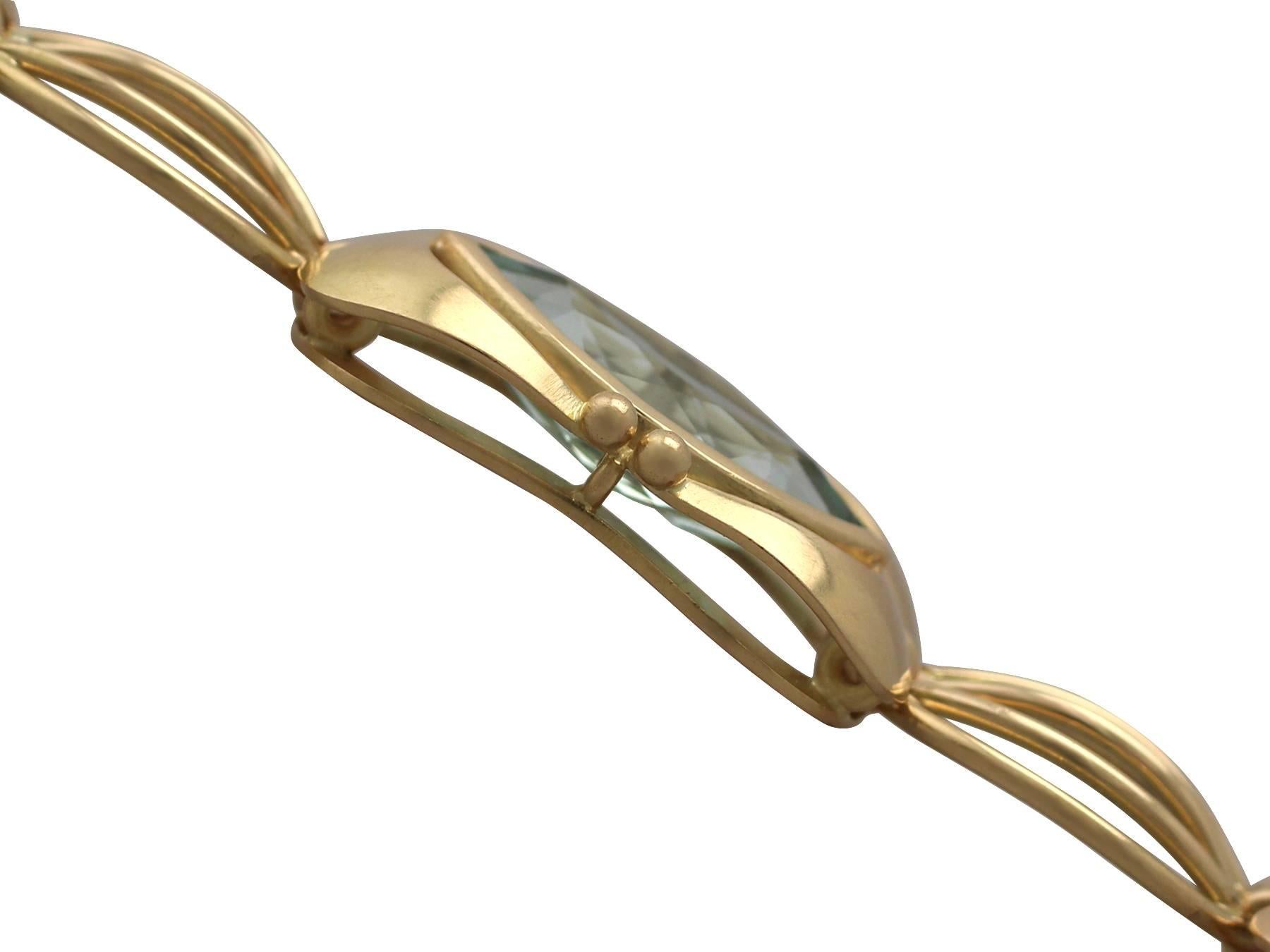 An exceptional, fine and impressive 9.18 carat aquamarine and 18 karat yellow gold bracelet in the Art Deco style; part of our diverse vintage jewelry and estate jewelry collections

This exceptional, fine and impressive vintage aquamarine bracelet