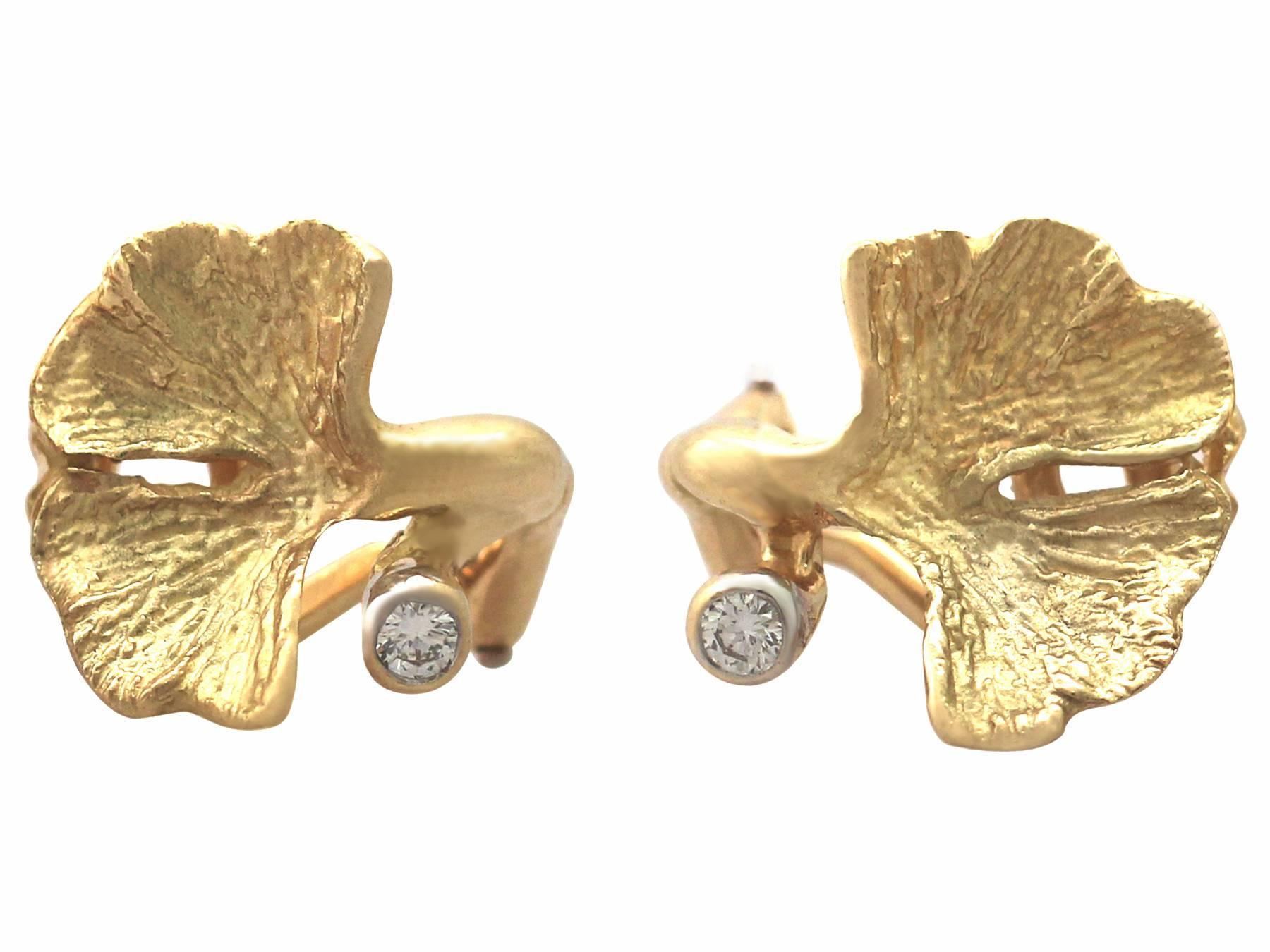A fine and impressive pair of vintage Belgian 0.04 carat diamond and 18 karat yellow gold clip on earrings; part of our diverse vintage jewelry and estate jewelry collections

These fine and impressive vintage diamond earrings have been crafted in
