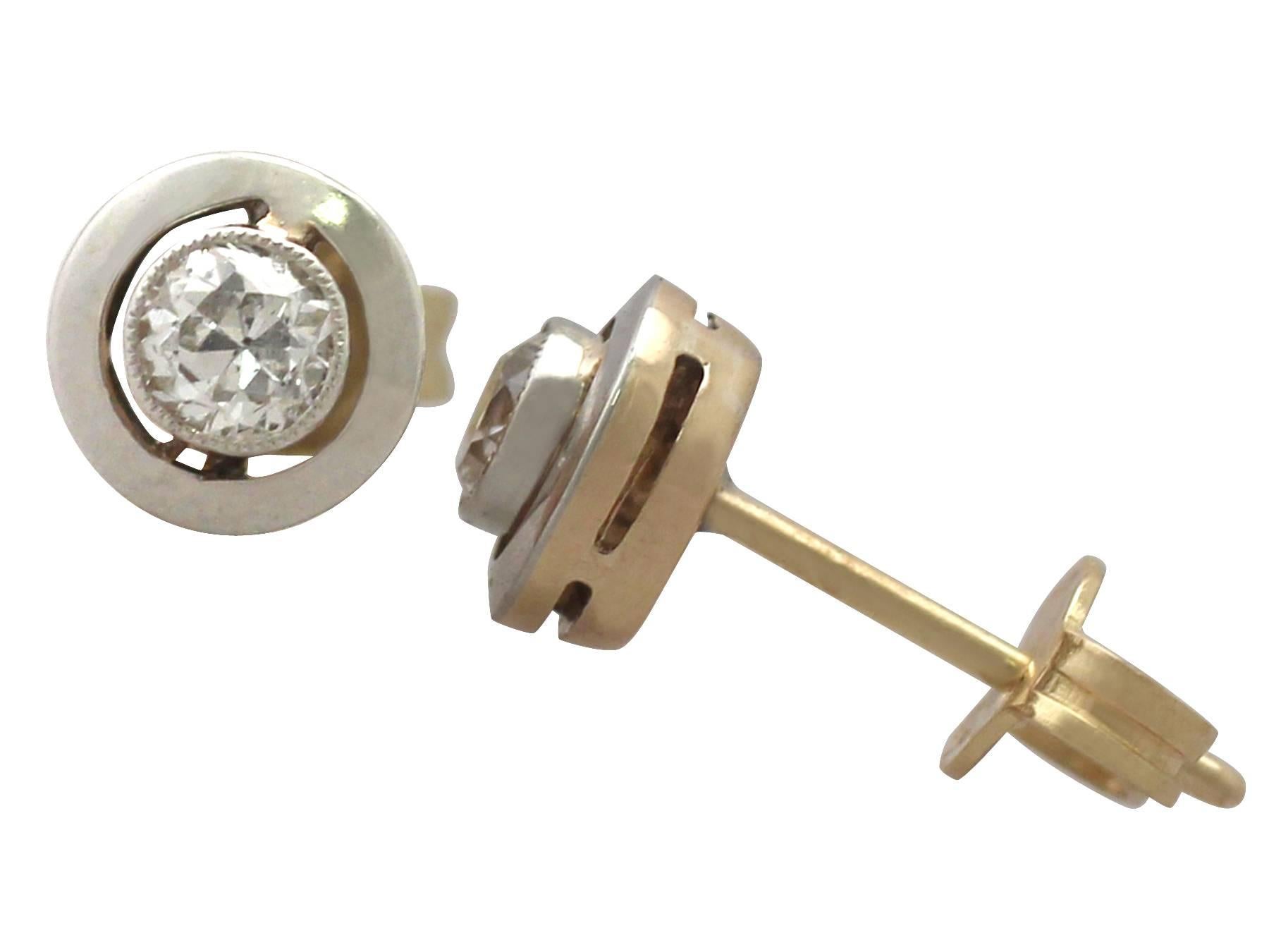 A fine and impressive pair of antique 0.36 carat diamond and 9 karat yellow gold, platinum set stud style earrings; part of our diamond jewelry and estate jewelry collections

These impressive antique 1920's stud earrings have been crafted in 9k