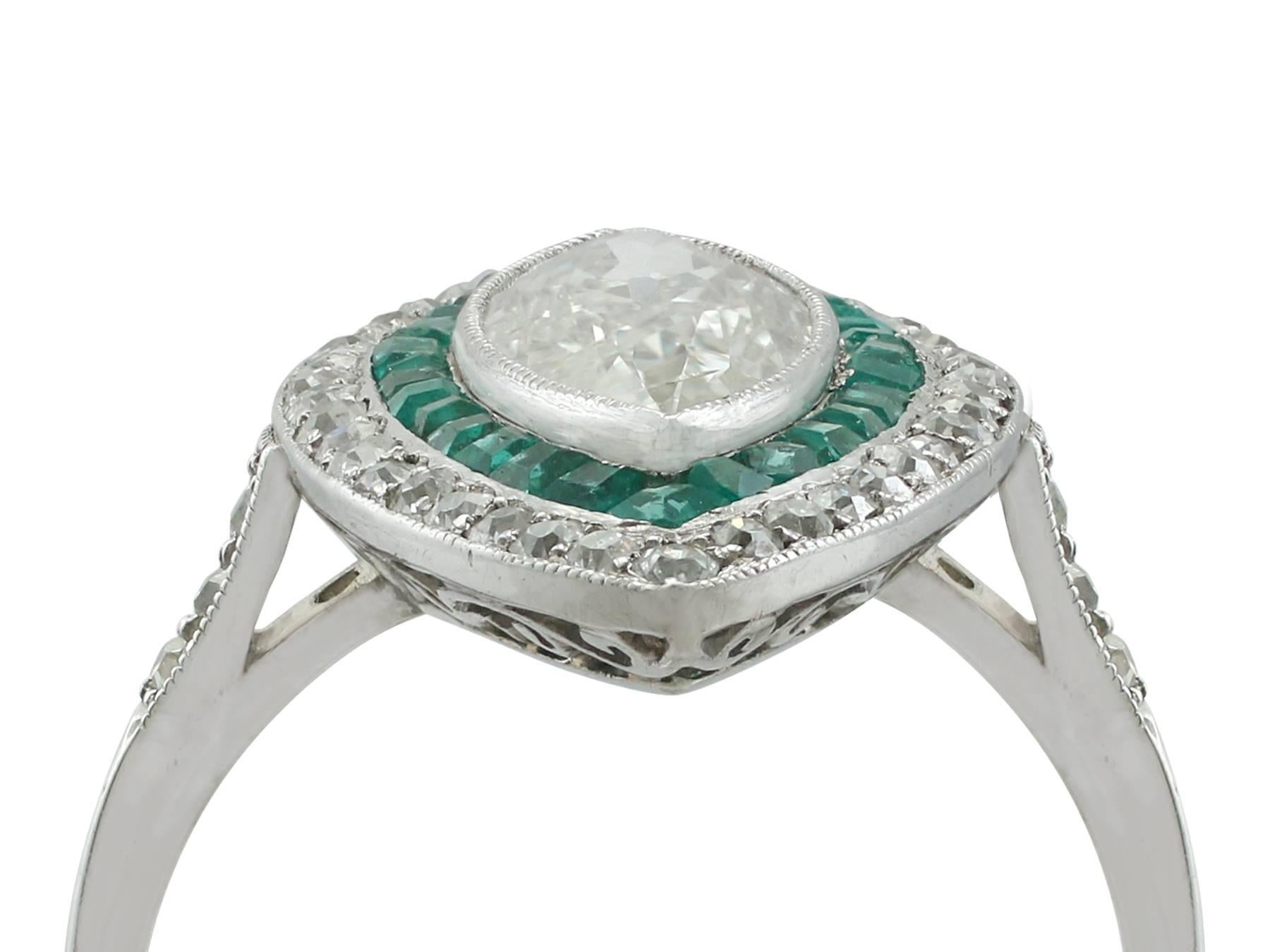 A magnificent, stunning and impressive 2.82 carat diamond and 0.86 carat emerald, 18 carat white gold marquise dress ring; part of our diverse antique jewellery collections.

This magnificent, fine and impressive large marquise diamond ring with