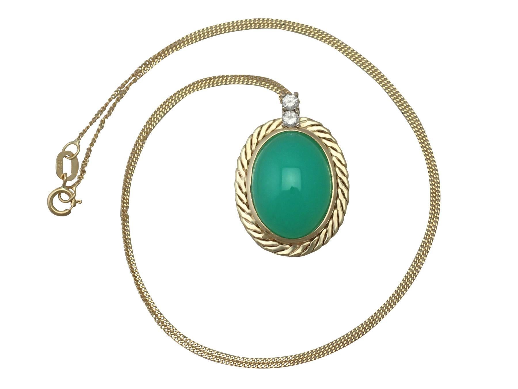 A fine and impressive antique 7.29 carat chrysoprase (green chalcedony), 0.08 carat diamond, 14 karat yellow gold pendant; part of our jewelry and estate jewelry collections

This fine and impressive chrysoprase pendant has been crafted in 14k