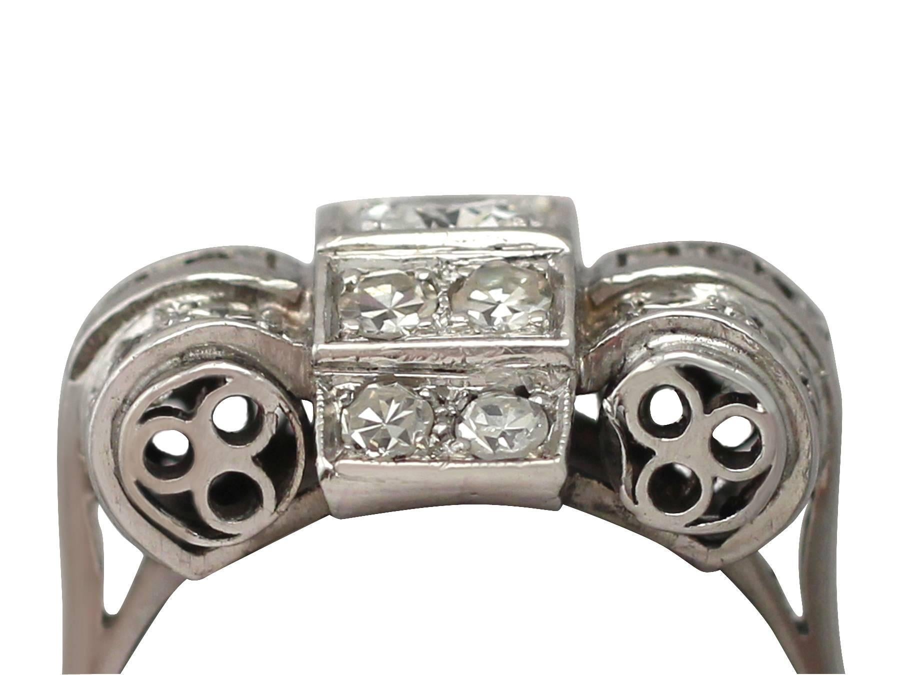 A stunning, fine and impressive 1.61 carat diamond (total) and 18k white gold dress ring in the Art Deco style; part of our diverse antique jewellery and estate jewelry collections

This stunning antique French diamond cluster ring has been crafted