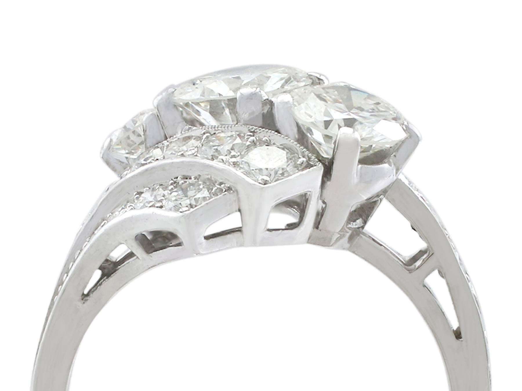 A stunning, fine and impressive vintage 2.67 carat multi-diamond cluster ring in platinum; part of our vintage jewellery and estate jewelry collections

This stunning, fine and impressive multi-diamond ring has been crafted in platinum.

The