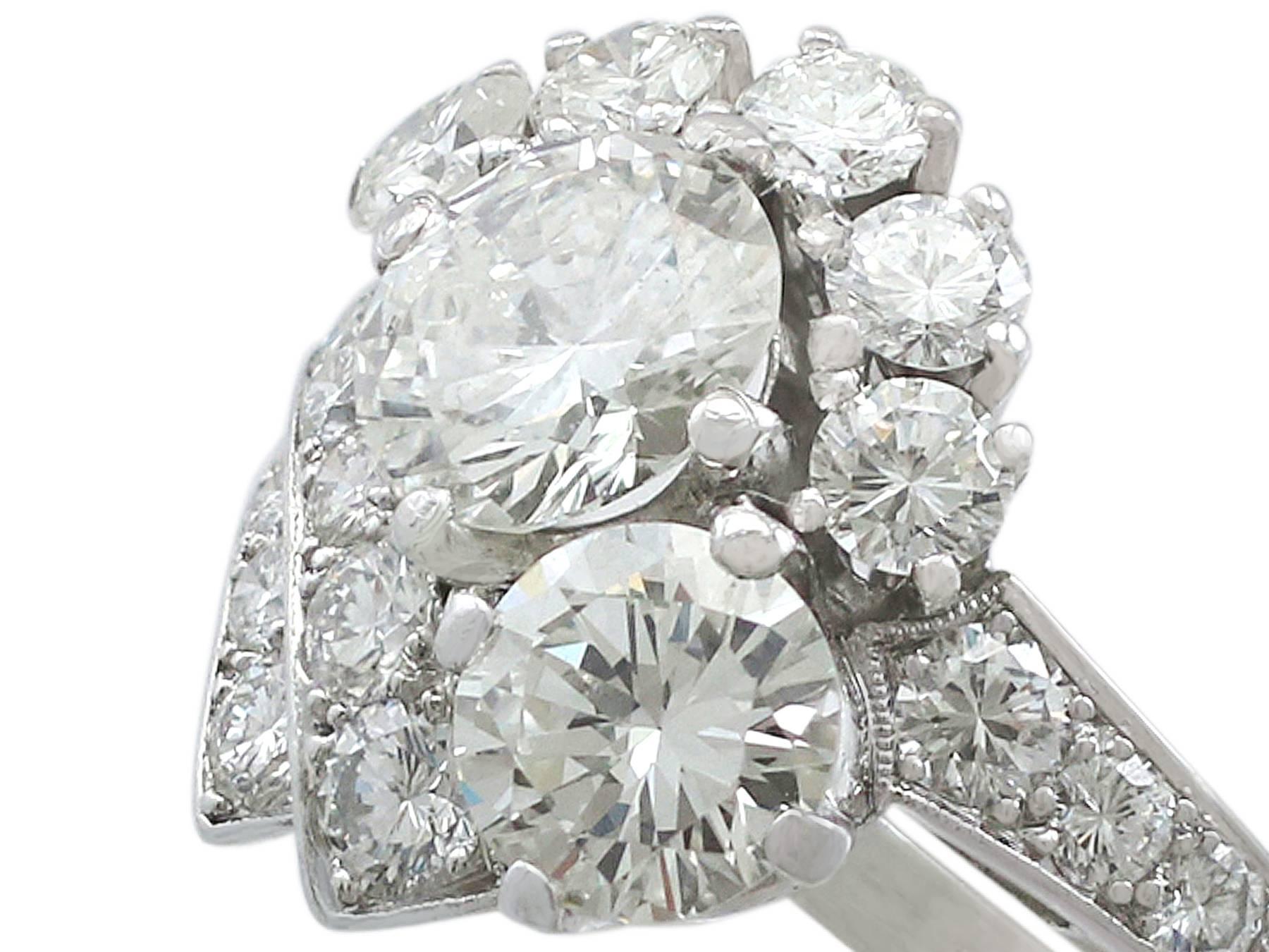 Round Cut 1950s 2.67 Carat Diamond Platinum Cluster Ring