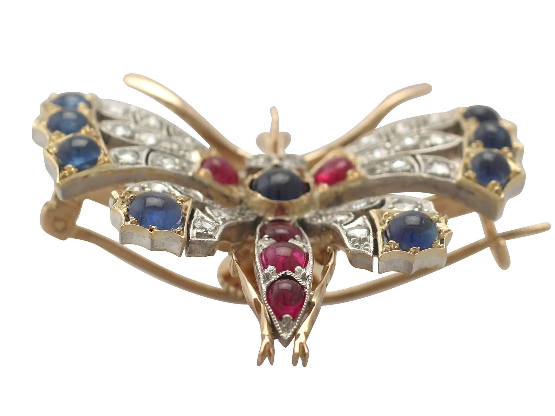 A stunning, fine and impressive 1.46 carat diamond, 2.62 carat sapphire and 1.10 carat ruby and 18 karat yellow gold butterfly brooch with a silver setting; part of our diverse antique jewellery and estate jewelry collections

This impressive