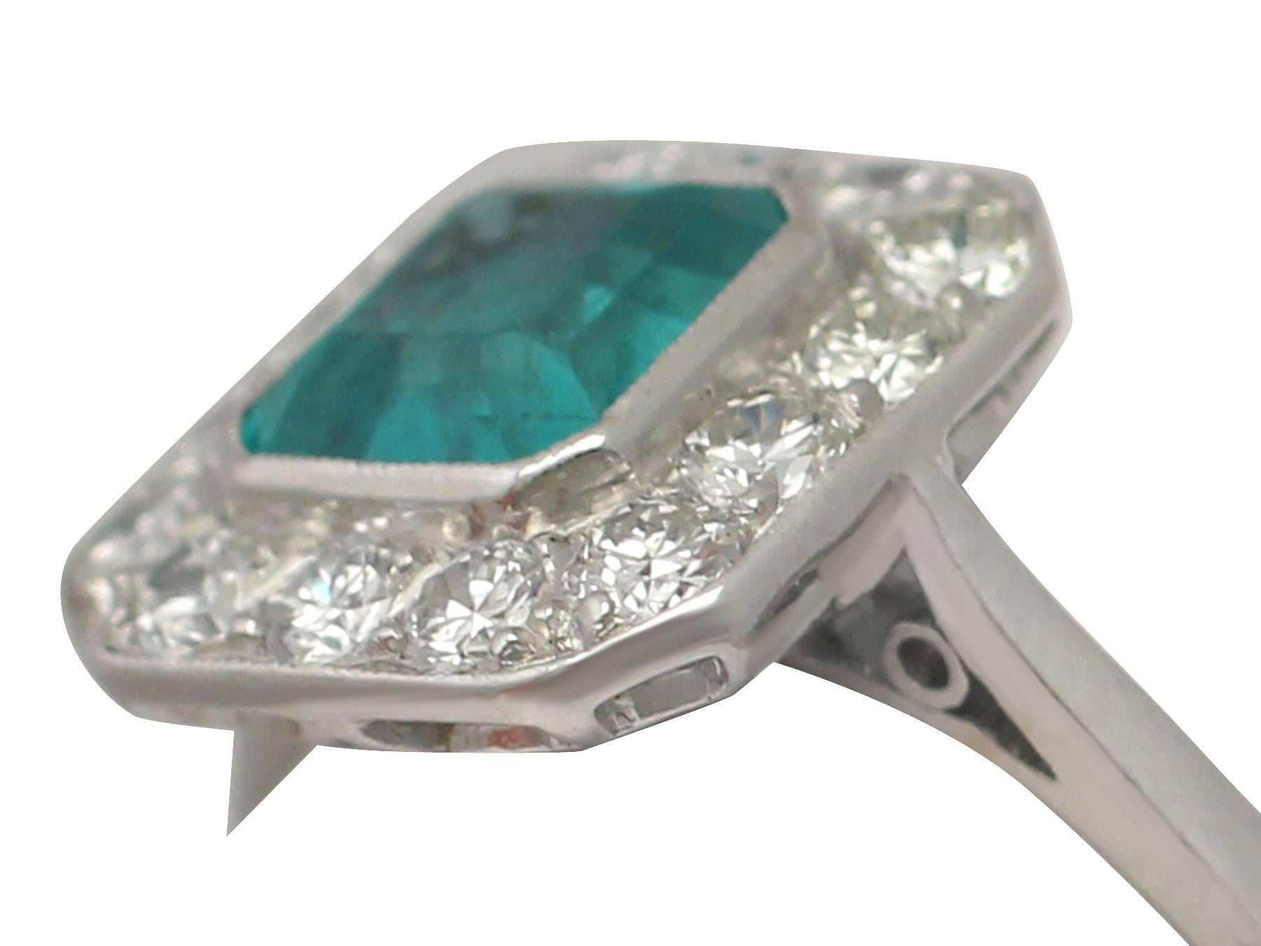 Retro 1940s 0.90 Carat Emerald and 0.42 Carat Diamond, Platinum Cluster Ring