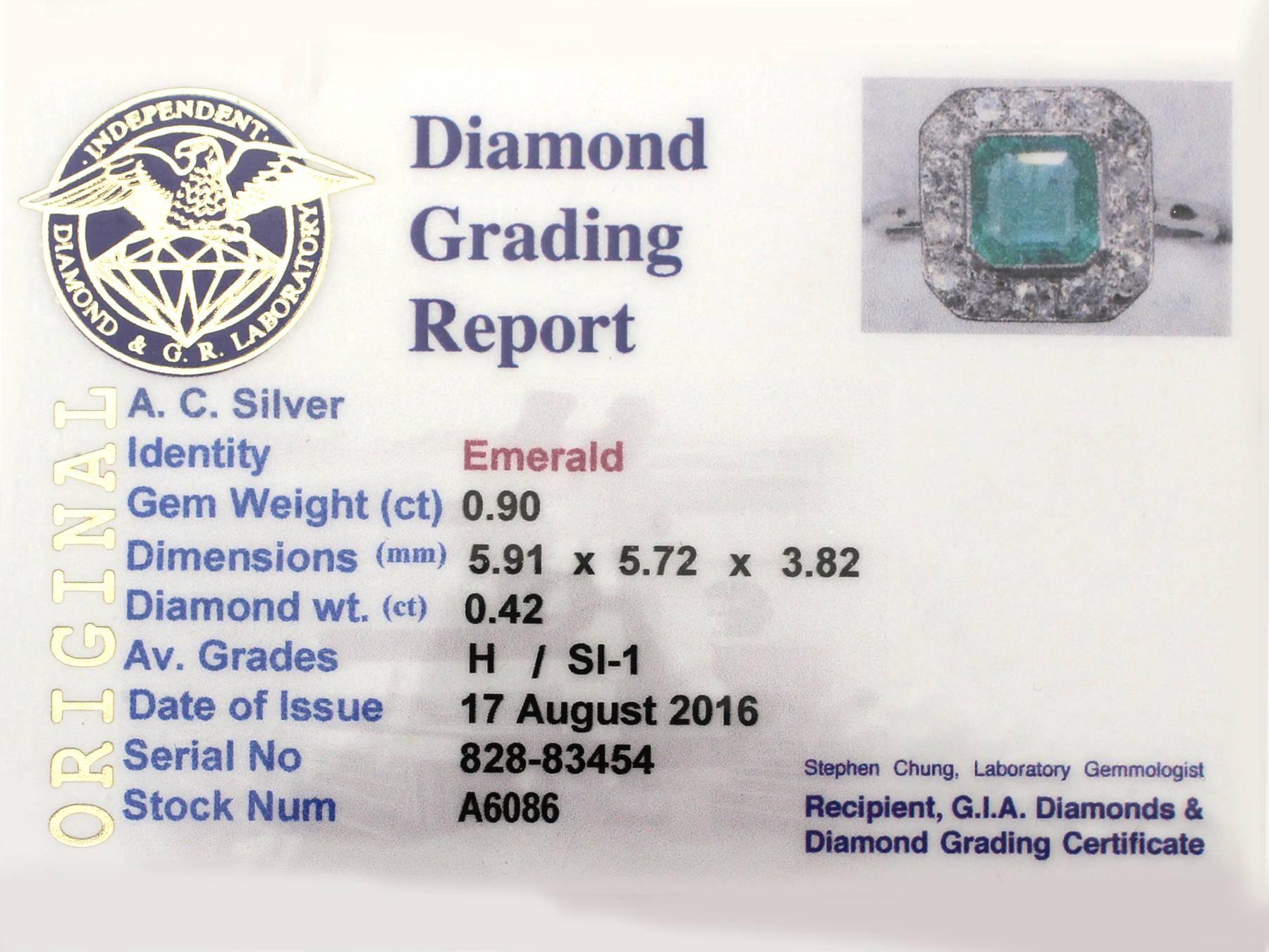 1940s 0.90 Carat Emerald and 0.42 Carat Diamond, Platinum Cluster Ring 1