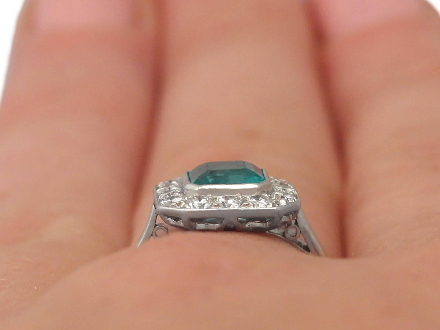 1940s 0.90 Carat Emerald and 0.42 Carat Diamond, Platinum Cluster Ring 4