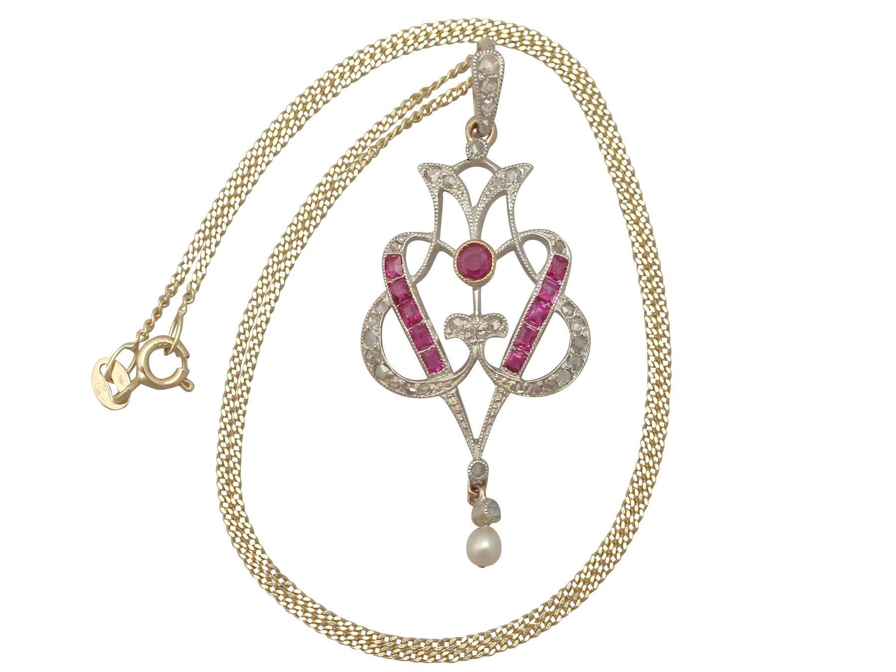 A fine and impressive antique Victorian 0.60 carat ruby and 0.29 carat diamond, seed pearl and 14 karat yellow gold, silver set pendant; part of our diverse antique jewelry and estate jewelry collections.

This fine and impressive diamond and ruby
