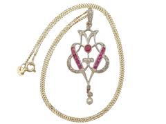 Victorian 0.60 Carat Ruby, 0.29 Carat Diamond, Pearl and 14 Karat Gold Pendant