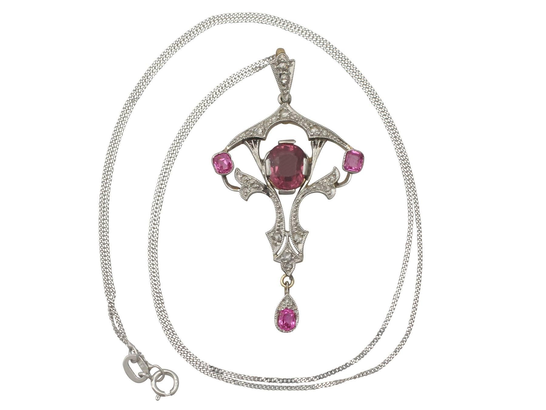 An exceptional, fine and impressive antique Belle Epoque 0.95 carat pink sapphire and 0.18 carat diamond, 18 karat yellow gold and platinum set pendant 

This exceptional, fine and impressive pink sapphire pendant has been crafted in 18k yellow