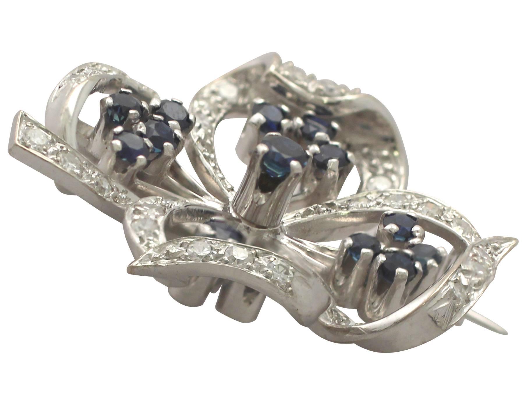 A fine and impressive 0.70 carat diamond and 0.51 carat blue sapphire, 18 carat white gold brooch in the form of a clover.

This fine and impressive vintage four leaf clover brooch has been crafted in 18 ct white gold.

The brooch has been crafted
