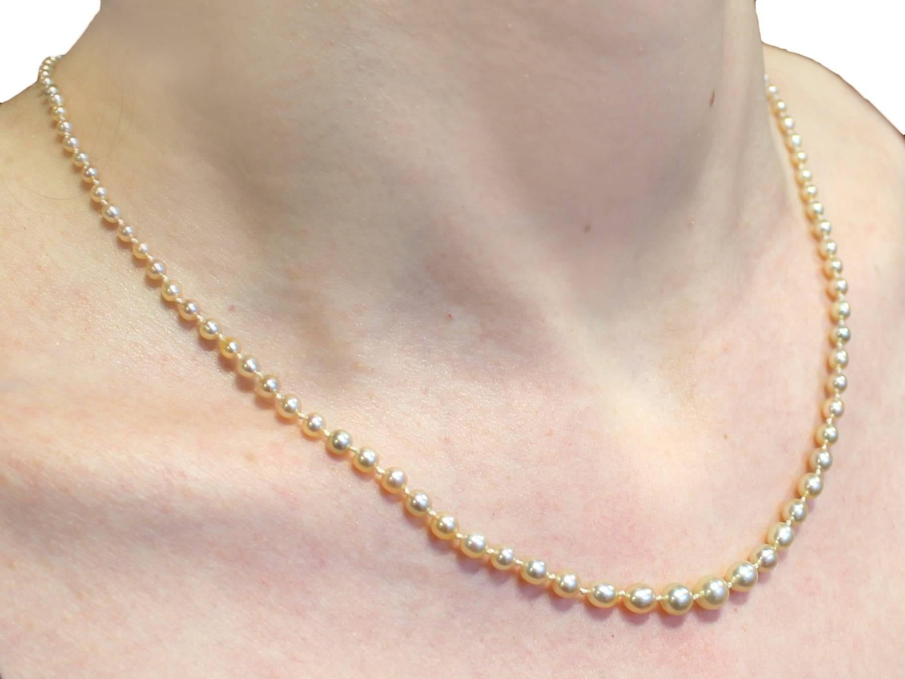 Natural Pearl Necklace with Diamond, Sapphire and Gold Clasp 6