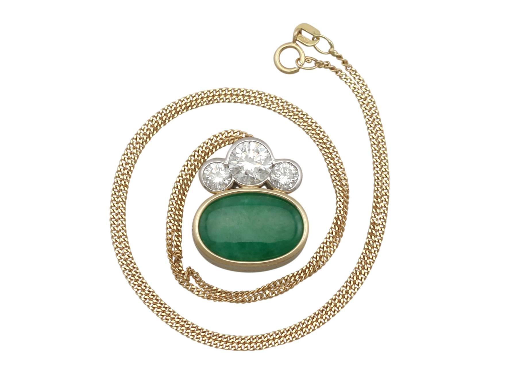 A stunning 4.05 carat nephrite jade and 1.82 carat diamond, 18 karat yellow gold and 18 karat white gold set pendant; part of our diverse gemstone jewelry collections

This stunning, fine and impressive vintage jade pendant has been crafted in 18k