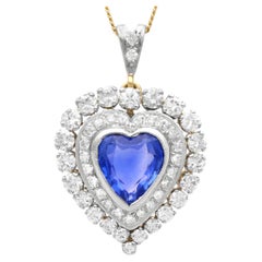 Ciondolo a forma di cuore in oro giallo 14k con zaffiro di Ceylon da 5,60 carati e diamante da 2,55 carati