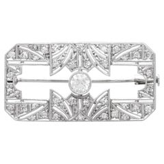 Broche Art déco ancienne en or blanc 18 carats sertie d'un diamant de 0,43 carat, vers 1920