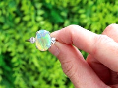 Antique 2.11 Carat Opal and 0.61 Carat Diamond Platinum Trilogy Ring Circa 1920